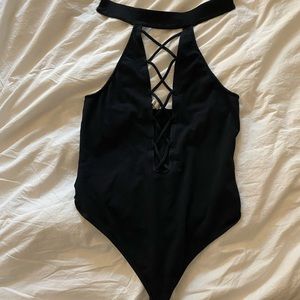 cross front body suit